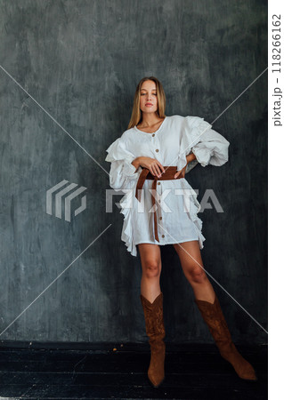 Beautiful slim fashion woman in white summer dress 118266162