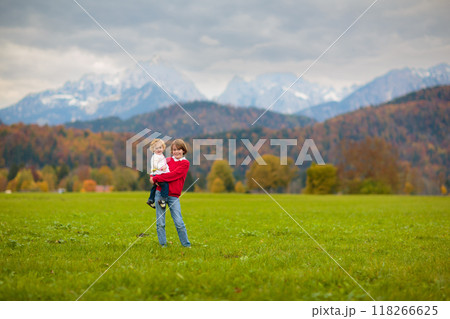 Family with kids hiking in the mountains Family with kids hiking in the mountains 118266625