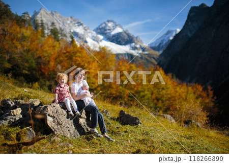 Family with kids hiking in the mountains Family with kids hiking in the mountains 118266890