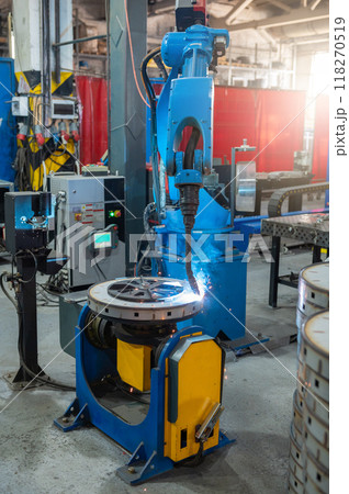 Automatic Industrial welding robot in a modern factory 118270519