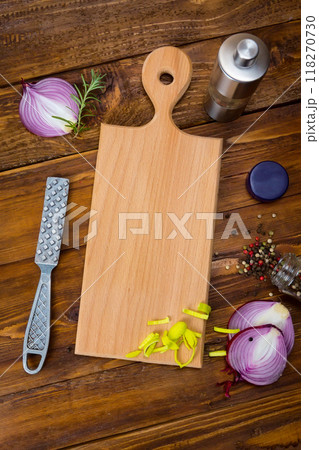 Spices frame on wooden table 118270730