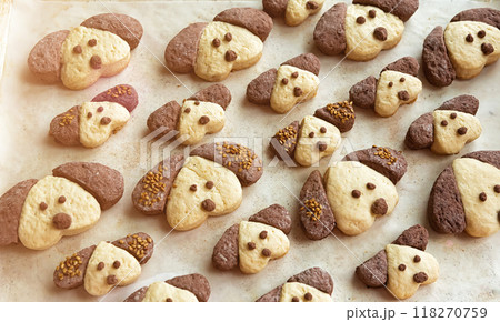 Cookies in the form of dogs in the form for baking Cookies in the form of dogs in the form for baking 118270759