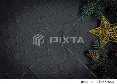 Christmas or New Year dark stone background, Xmas black board framed with season decorations, space for a text, view from above 118271098