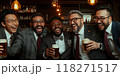 Group of men of different nationalities and age, business partners, dressed in stylish business suits, meeting at bar, smiling and relaxing in bar after work 118271517