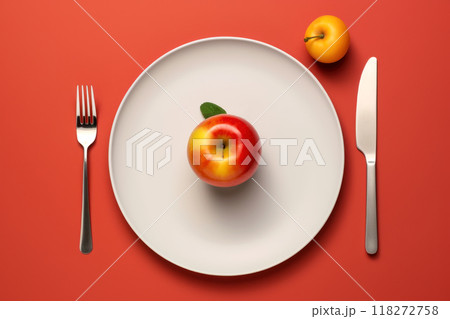 Minimalist food presentation with a fresh apple on a white plate 118272758