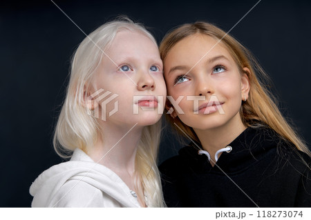 two good looking girls dreaming looking up two good looking girls dreaming looking up 118273074