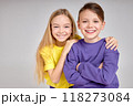 Happy kids are standing together at sudio 118273084