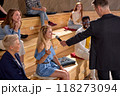 Speaker Giving Microphone to Female Students During Conference, Lecture. 118273094