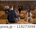 Group Of Multi-ethnic People Clapping Hands After Speaking Of Man Couch Professor 118273098
