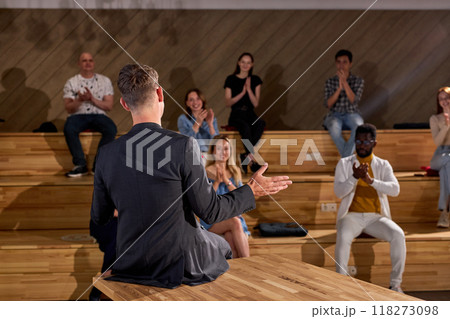 Group Of Multi-ethnic People Clapping Hands After Speaking Of Man Couch Professor Group Of Multi-ethnic People Clapping Hands After Speaking Of Man Couch Professor 118273098