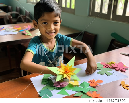 A Creative Boy Truly Engaged in Various Colorful Art and Craft Activities 118273292