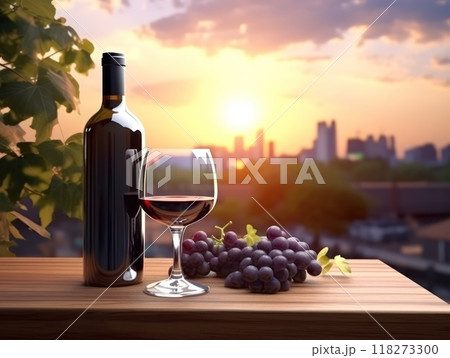 A Beautiful sight of a rustic table adorned with sunset bottle and glass of wine and fresh grapes 118273300