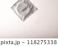Condom on white light background. Mens contraception. Sexually transmitted diseases infections protection. Concept of birth control. Safe sex. STD. High quality photo 118275338