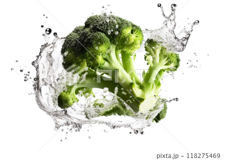 Fresh broccoli splashing into water with dynamic droplets captured against a clean backdrop 118275469