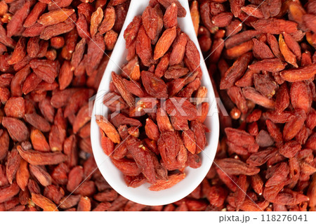 Dried Goji berries Lycium barbarum in a spoon top view Dried Goji berries Lycium barbarum in a spoon top view 118276041