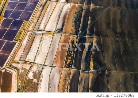 Fly over seawater filled salt pans for producing sea salt on Pag Island, Croatia. 118279068