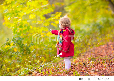 Kids playing in autumn park 118280221