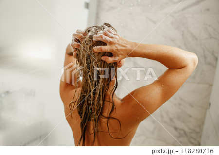 Experience a Refreshing Shower Routine with Lathering Hair Care for Ultimate Relaxation 118280716