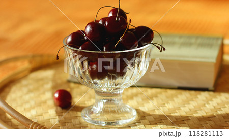Cherry. a light snack with cherry berries. a vase of berries on a tray in bed. summer food Cherry. a light snack with cherry berries. a vase of berries on a tray in bed. summer food 118281113