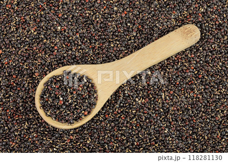 black quinoa in wooden spoon as a background. Top view. Flat lay black quinoa in wooden spoon as a background. Top view. Flat lay 118281130