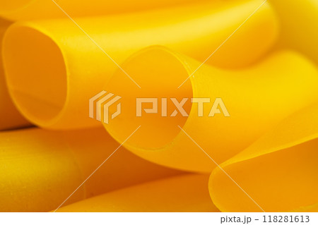 Special gluten free Cannelloni. Cylindrical type of egg-based Italian pasta. Organic uncooked ingredient. Macro shot 118281613