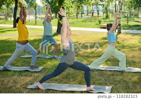 People stretching legs and raising arms People stretching legs and raising arms 118282323