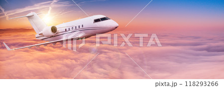 Passengers commercial airplane flying above clouds in sunset light. Concept of fast travel, holidays and business. 118293266