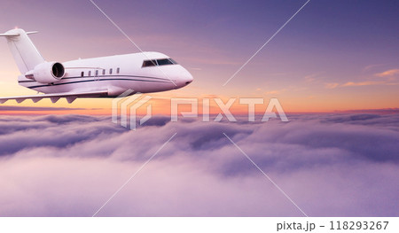 Passengers commercial airplane flying above clouds in sunset light. Concept of fast travel, holidays and business. 118293267
