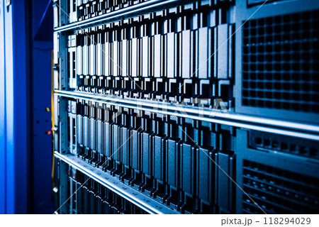 cluster of data storage SSD hard drives inside server rack 118294029