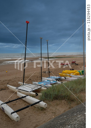 Beach of Cabourg with black clouds Beach of Cabourg with black clouds 118294453