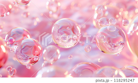Colorful soap bubbles float against a soft pink background, creating a dreamy, ethereal atmosphere perfect for backgrounds and design elements. 118295247
