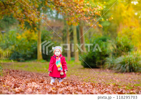 Kids playing in autumn park Kids playing in autumn park 118295703