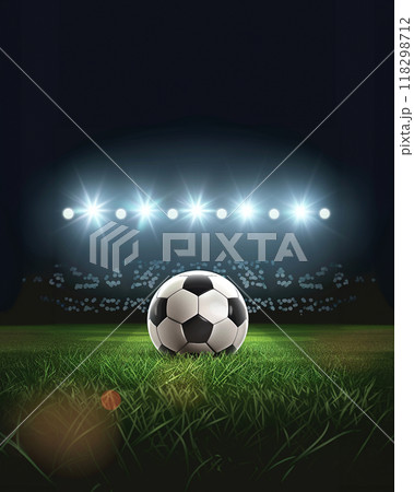 a soccer ball on green field with blur stadium at background 118298712
