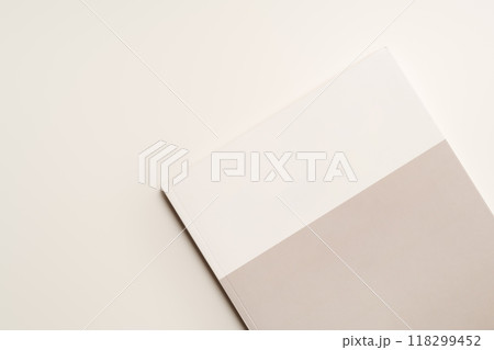 Stack of blank paper on beige background Stack of blank paper on beige background 118299452