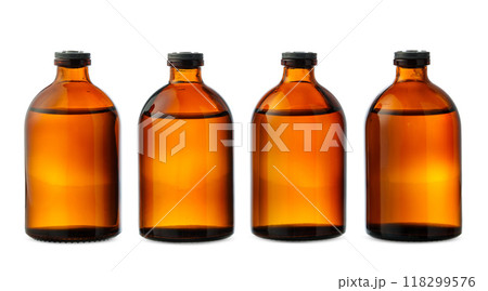 Four Amber Glass Bottles With Black Caps on a White Background Four Amber Glass Bottles With Black Caps on a White Background 118299576