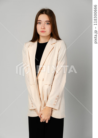 Young Woman in Black Shirt and Black Pants in Studio Young Woman in Black Shirt and Black Pants in Studio 118300666
