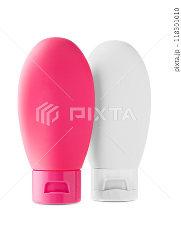 Travel-sized squeeze bottle for toiletries displayed against a plain background Travel-sized squeeze bottle for toiletries displayed against a plain background 118301010