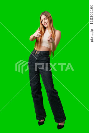 Smiling Young Woman Pointing at Camera With Green Screen Background 118301160