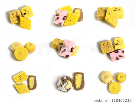 Set of delicious Indian sweets on white background. sweets collection. Top view Set of delicious Indian sweets on white background. sweets collection. Top view 118305236