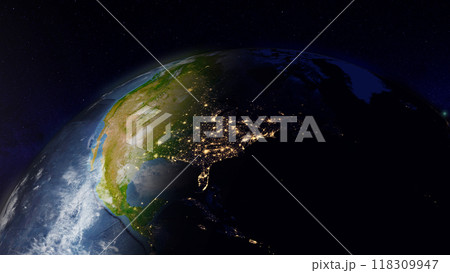 The vast expanse of North America is displayed from space, showcasing vibrant city lights along the eastern coastline against darkened landmasses and the beautiful curvature of the Earth. The vast expanse of North America is displayed from space, showcasing vibrant city lights along the eastern coastline against darkened landmasses and the beautiful curvature of the Earth. 118309947