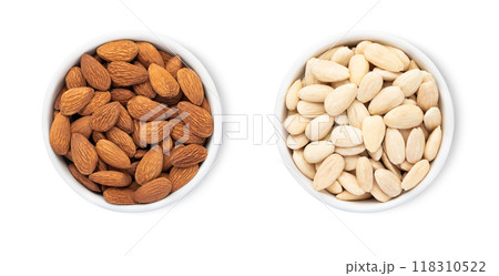 Bowls with organic healthy almond nuts isolated on white background.Top view. Bowls with organic healthy almond nuts isolated on white background.Top view. 118310522