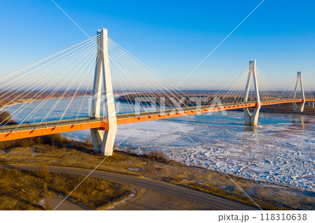 Winter landscape of Oka river with cable-stayed Murom bridge 118310638