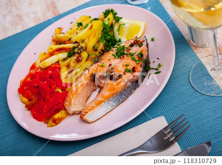 Grilled salmon with pepper and french fries Grilled salmon with pepper and french fries 118310729