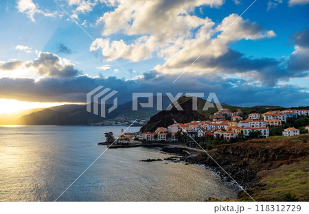 Sunset on Ponta de Sao Lourenco peninsula with traditional resort village. Madeira Island Portugal. 118312729