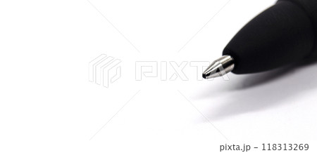 Top view of black pen on a wide white paper with customizable space for text or ideas. Copy space concept Top view of black pen on a wide white paper with customizable space for text or ideas. Copy space concept 118313269