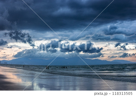 Beach with beautiful rain clouds Beach with beautiful rain clouds 118313505