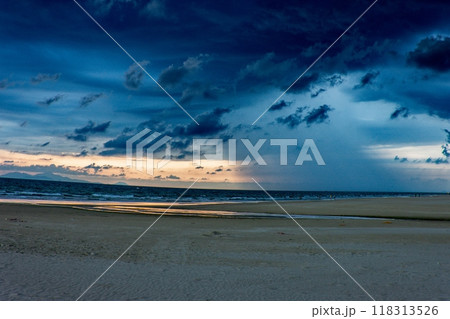Beach with beautiful rain clouds Beach with beautiful rain clouds 118313526