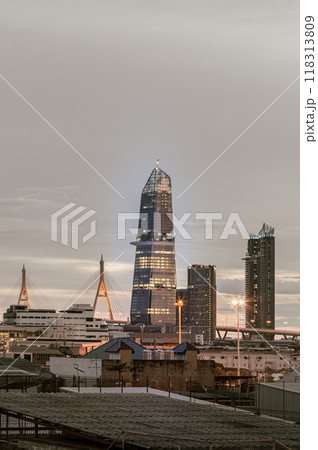 City view with KingBridge tower alongside the iconic landmark of Bhumibol Bridge. City view with KingBridge tower alongside the iconic landmark of Bhumibol Bridge. 118313809