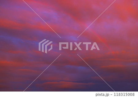 A breathtaking vibrant and colorful sunset sky with rainbow 118315008