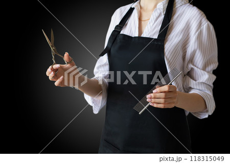The concept of professionalism and skill of a hairdresser. 118315049